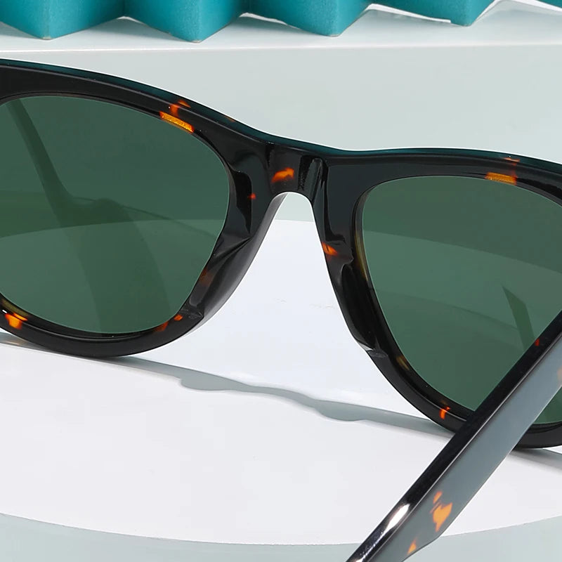 ROGBAE 214S Oval Acetate Sunglasses — Glass Lens
