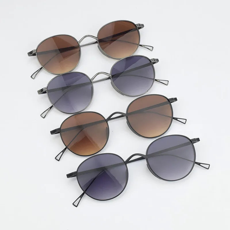 TAG Hezekiah KMN113 Titanium Oval Sunglasses
