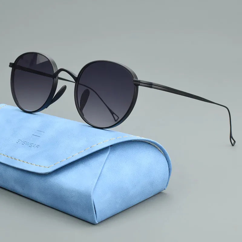 TAG Hezekiah KMN113 Titanium Oval Sunglasses