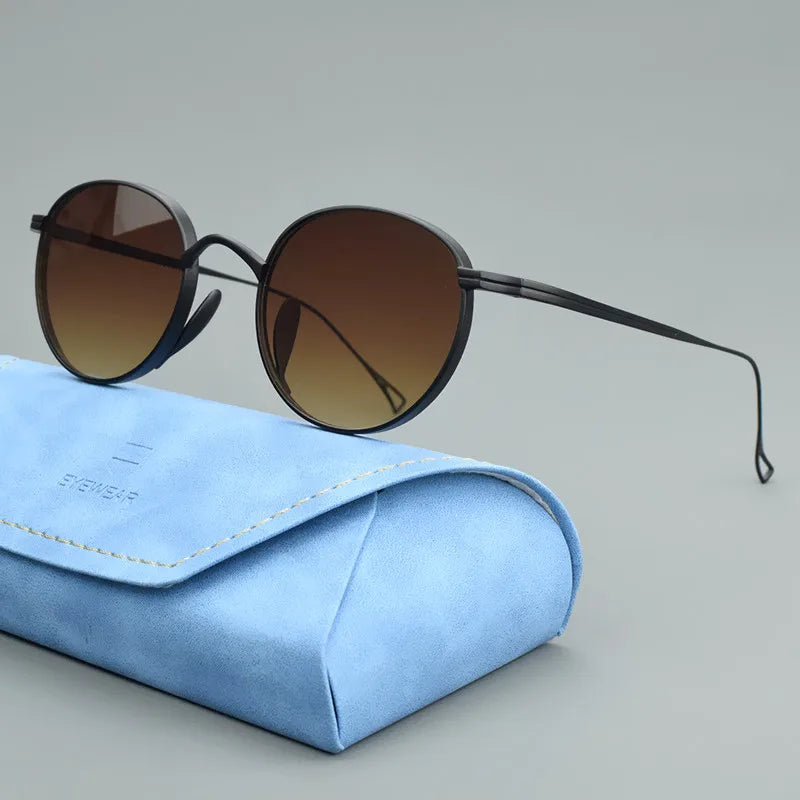 TAG Hezekiah KMN113 Titanium Oval Sunglasses