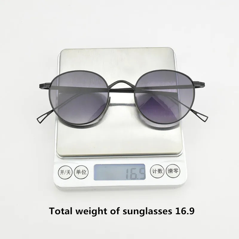 TAG Hezekiah KMN113 Titanium Oval Sunglasses